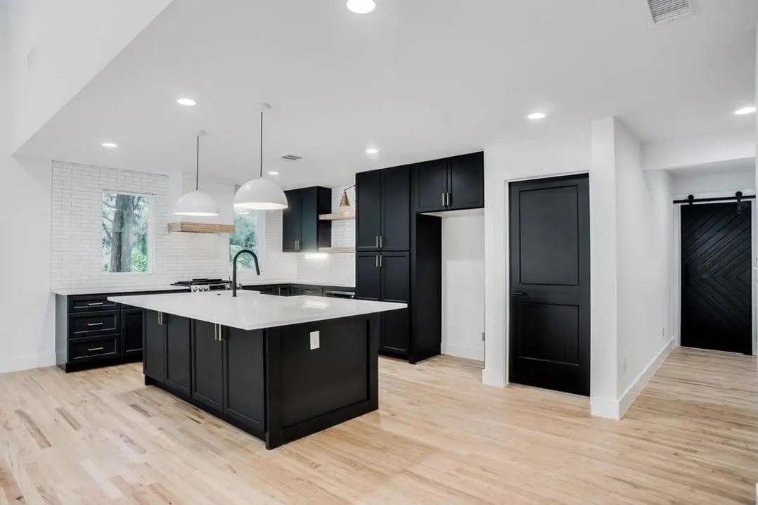 Modern kitchen renovation by General Contractor Parkland with custom cabinets and countertops.
