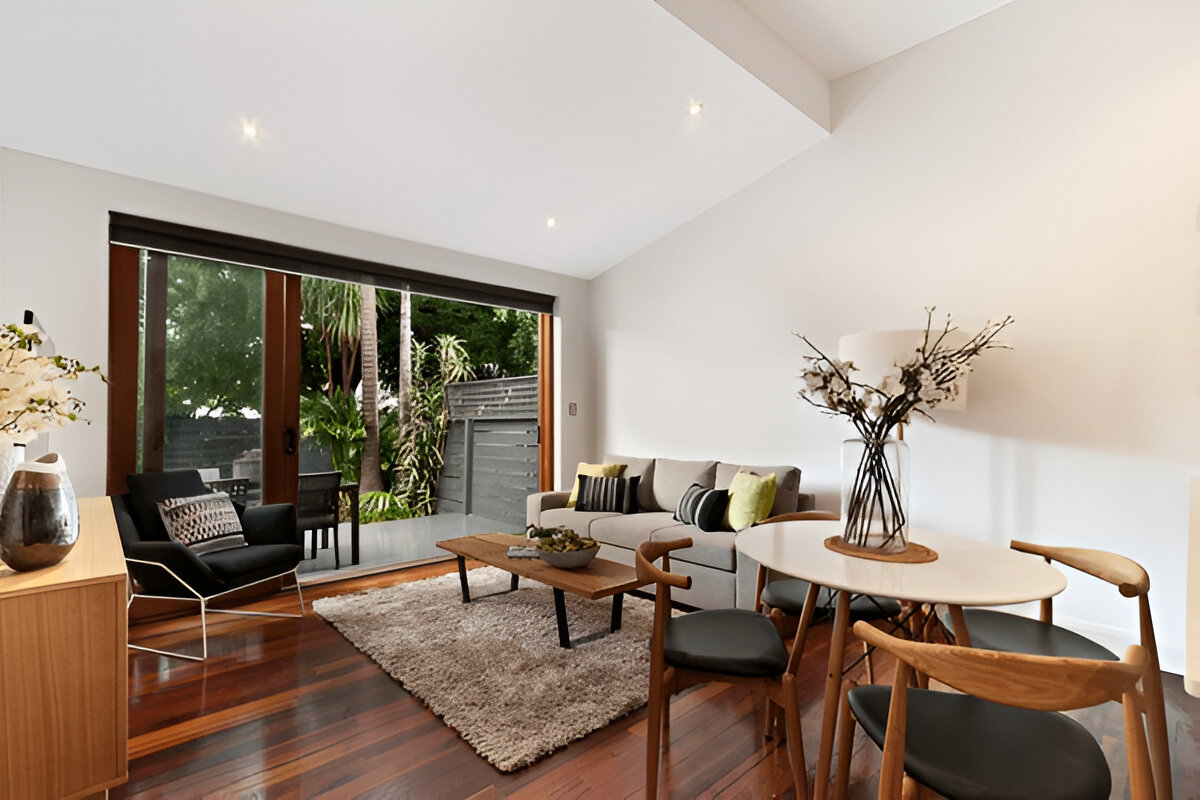 Renovision Design & Build General Contractor creating an open concept living space with seamless design and professional execution.